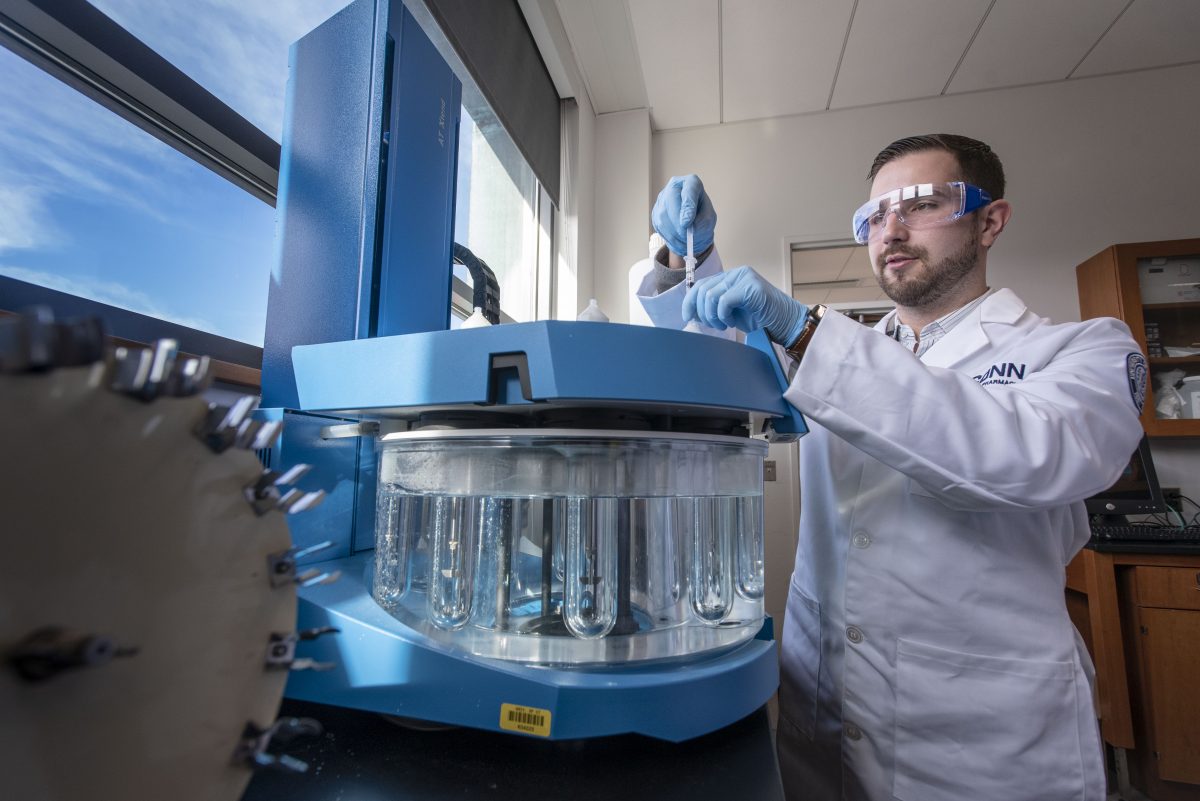 Pharmacy student in lab